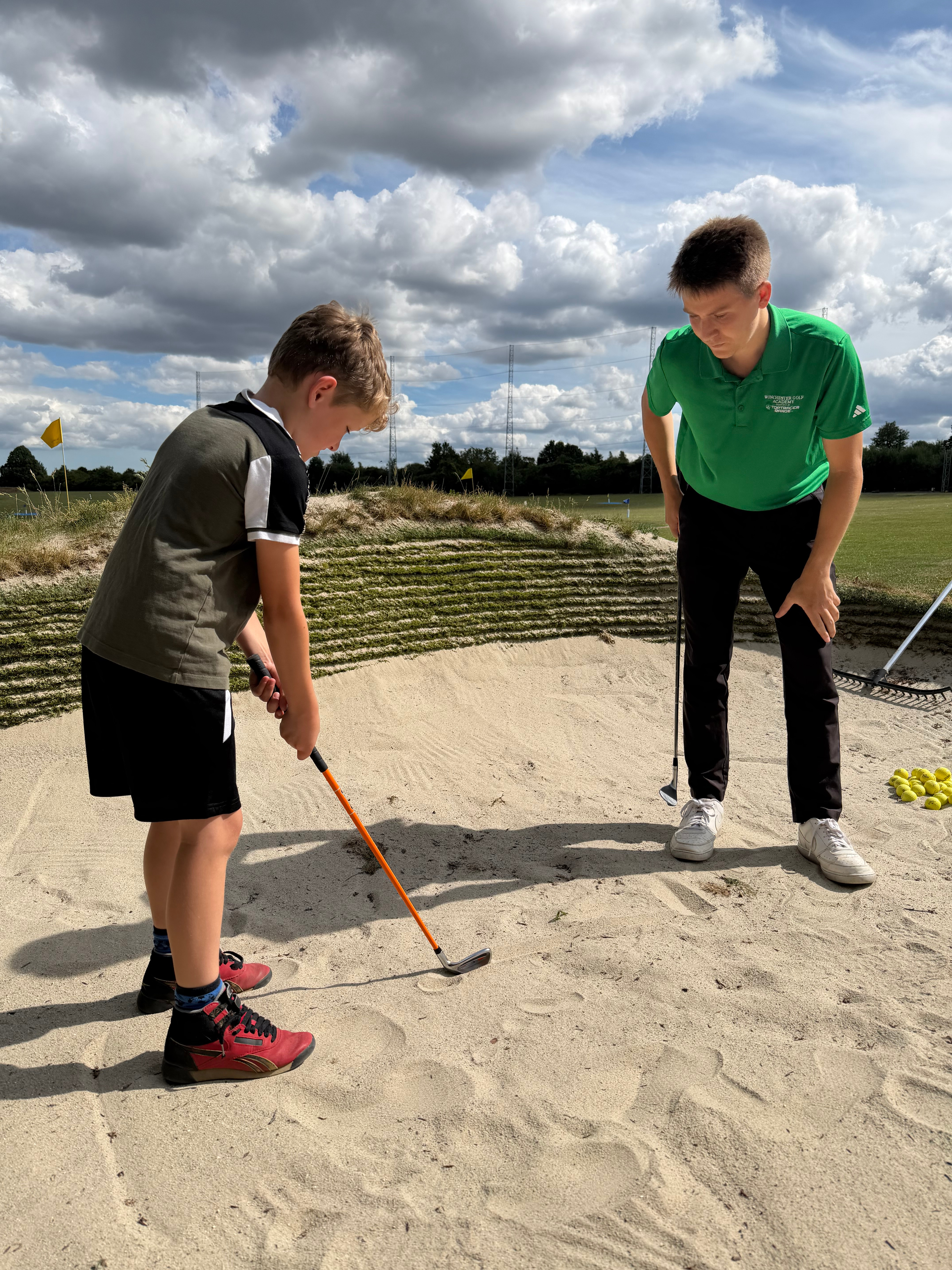 Andrew Reid coaching a golfer at Winchester Golf Academy